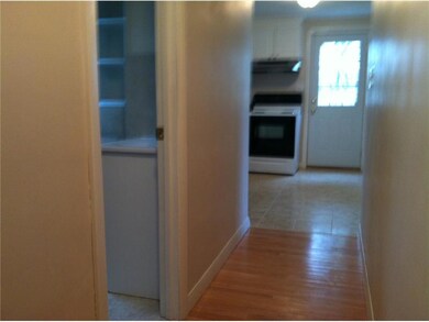 Exterior Front. Hallway to bath and bedrooms