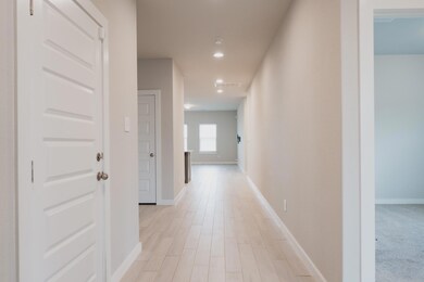 Hall featuring recessed lighting, baseboards, vis