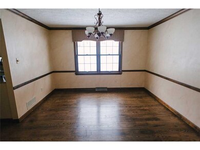 Dining Room. Notice the crown molding and updated 