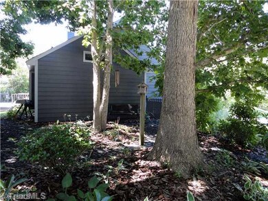 Land/Lot. Well landscaped & private side yard sitting area