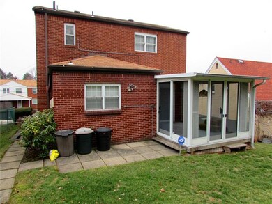 rear of house with sun room