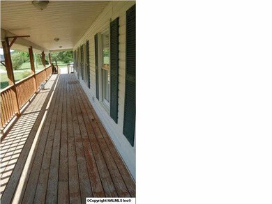 Plenty of room on this porch for all the rocking chairs you want.