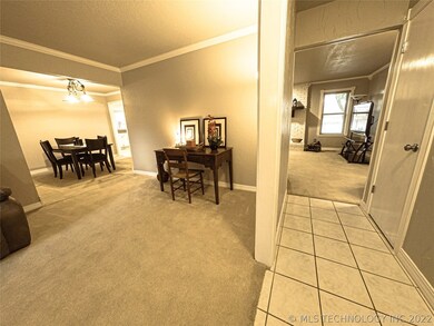 Living room adjacent to entry