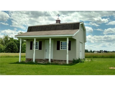 Yard barn with character and ample storage.