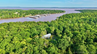 Aerial view of property and surrounding area with