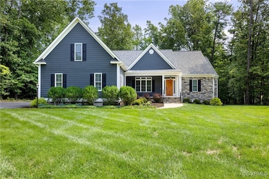View of front of house featuring covered porch and