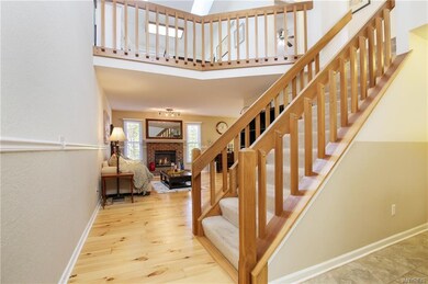Neutral wall colors with crisp white railing accen