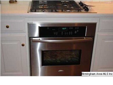 The stainless appliances have just been installed.