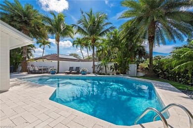 View of pool featuring a patio area, a fenced back