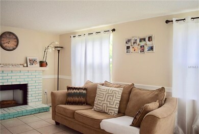 Great Family room with decorative Fireplace.