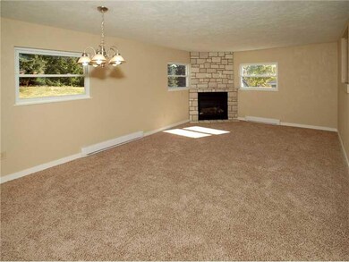 Family Room. Bright & cozy with stone fireplace/ga