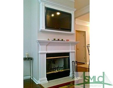 Living Room. Custom framing of flat screen tv over