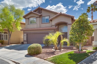 Mediterranean / spanish-style home featuring a til
