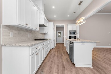 Kitchen looking to the garage door