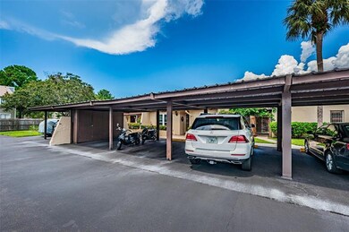Covered parking right in front of your unit! (White Mercedes SUV in the spot!)