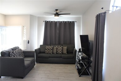 Living room with light wood-style floors and ceili