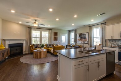 Lovely open concept living! *colors will vary*