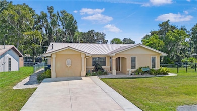 1119 Cr 457, Lake Panasoffkee, FL 33538 - photo 2