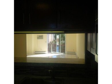 Living Room. VIEW THRU KITCHEN