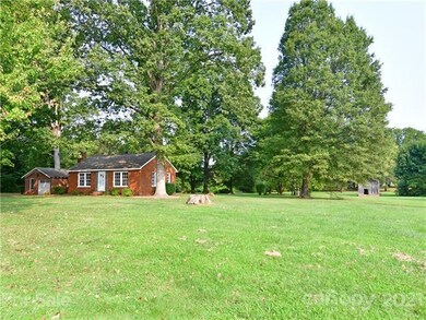 Level partially opened & wooded.