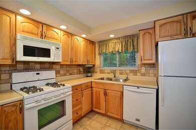 Updated kitchen with tile back splash and recessed