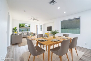 Open Floorplan living and dining flooded with natu