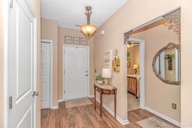 Entryway featuring light wood-style floors, visibl