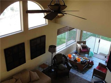 View of living/dining areas from upstairs.  Notice