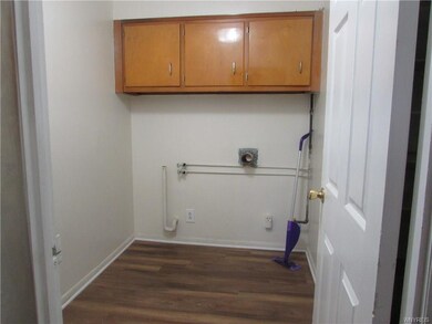 Convenient laundry room & large walk in pantry to 
