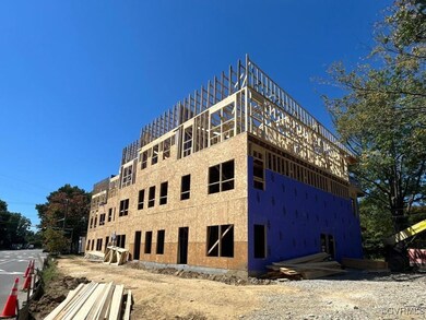 Photo of the home currently under construction.