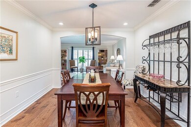Dining/living combo with updated lighting.