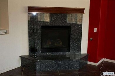 Granite Fireplace in the Family Room