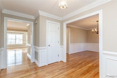 Foyer open to newly painted Dining Room to the rig