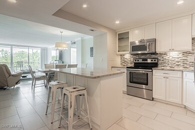 Kitchen featuring stainless steel appliances, tast