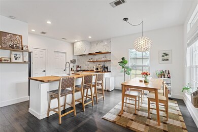 Kitchen with open shelves, dark wood-style floori