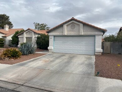 View of front of property with stucco siding, an o