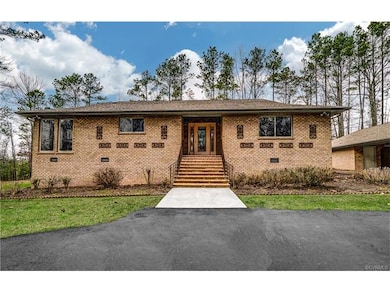 Large Front Stoop Starts this Unforgettable Home T