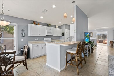 This useful island features plenty of countertop s