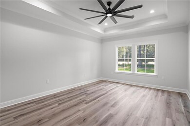 Primary Bedroom with Trey Ceilings