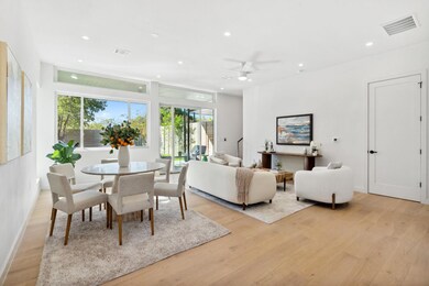 Dining room featuring light wood-style floors, a 