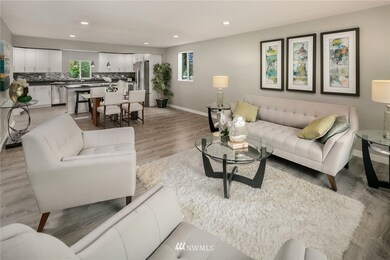 Spacious, open floor design with gorgeous hardwood floors and gorgeous, brand new kitchen