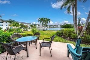 View of patio featuring a water view