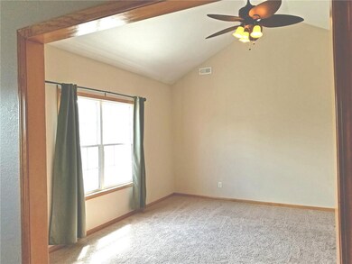 Living room with vaulted ceiling