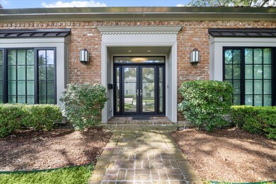 Western Window Systems' sleek entryway doors and windows, framing the entrance with sophistication.