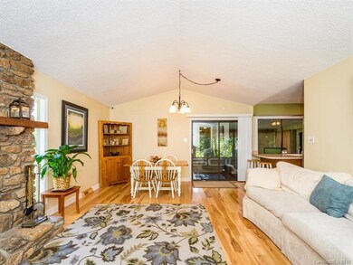 open floor plan with vaulted ceilings and beautifu