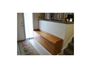 Built in storage bench in the entryway.