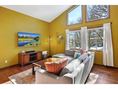 The fabulous living room showcases impressive vaul