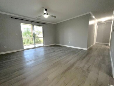 Spare room with wood-type flooring, ornamental mol