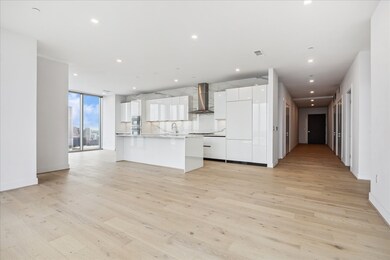 Spacious foyer, engineered hardwood floors and 10