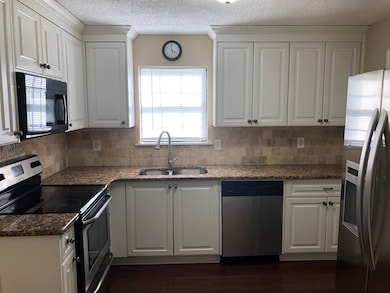 Kitchen with granite countertops!
